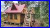 Build_A_Wooden_House_Cabin_With_2_Doors_And_A_Balcony_On_High_For_Sightseeing_And_Drinking_Tea_01_mpua