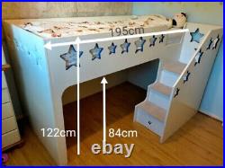 Custom wooden bunk bed with play area and storage, white and blue