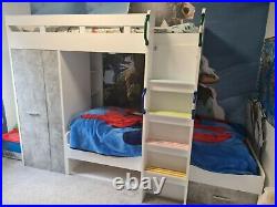 Kids bunk bed with wardrobe, drawer and shelves
