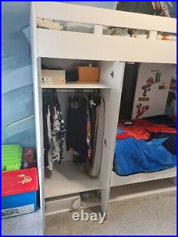 Kids bunk bed with wardrobe, drawer and shelves