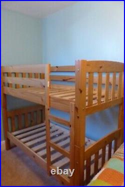 WOODEN BUNK BEDS with mattresses. Shorty length