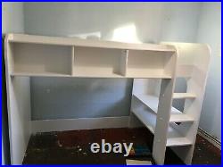 White bunk bed with storage shelves and play/ study area. Shelves/ ladder