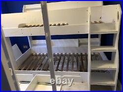 White bunk beds with storage