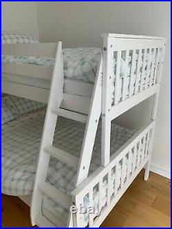 White triple wooden bunk beds with mattresses. Hardly used
