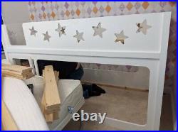 White wooden bunk beds