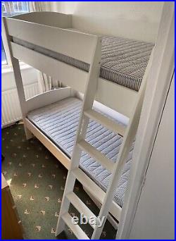 White wooden bunk beds with mattresses. Great condition